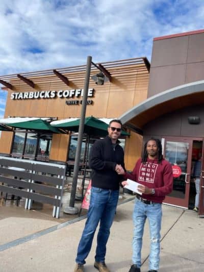 personal injury lawyer client getting check in arizona