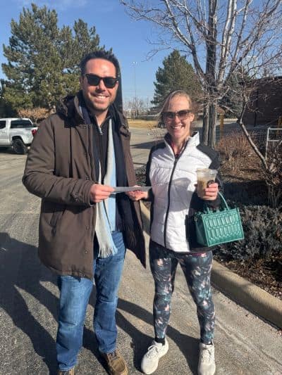 personal injury victim getting check from Brendan McQuaid (2)