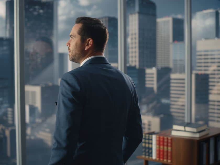 Personal Injury Attorney Brendan McQuaid looking outside of window